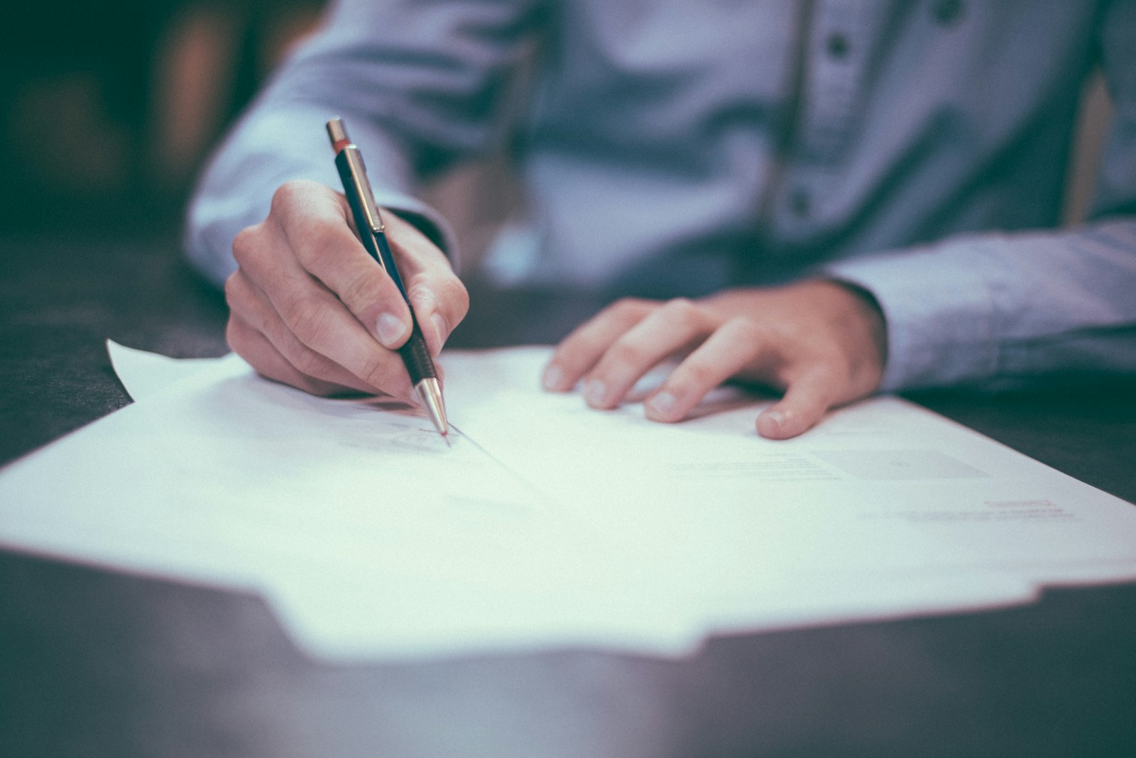 Lawyer reviewing a sale and purchase agreement