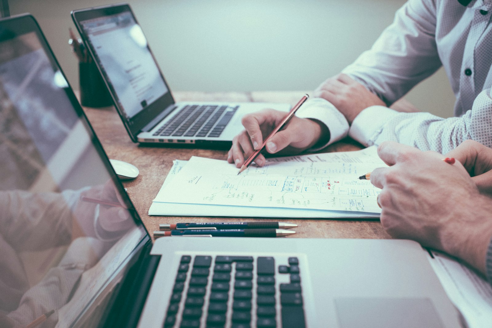 Mortgage and refinancing documents on a desk