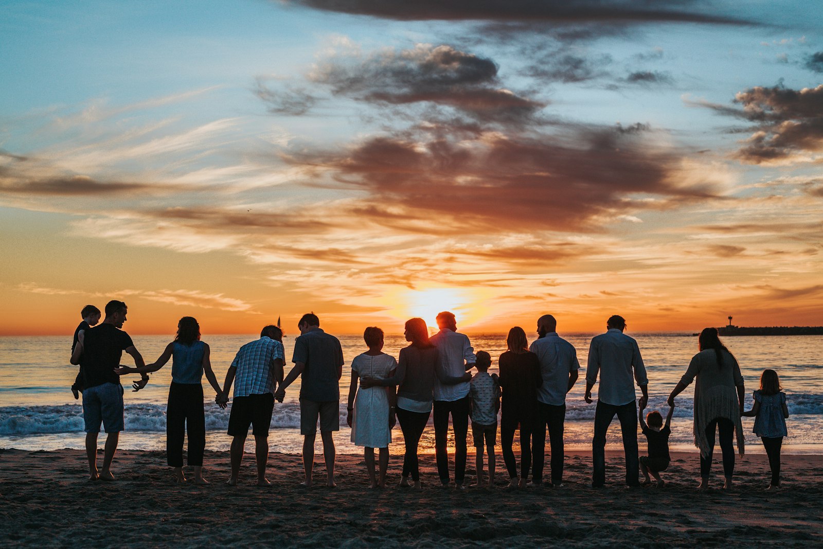 Family standing together, representing clients who plan estates for the next generation